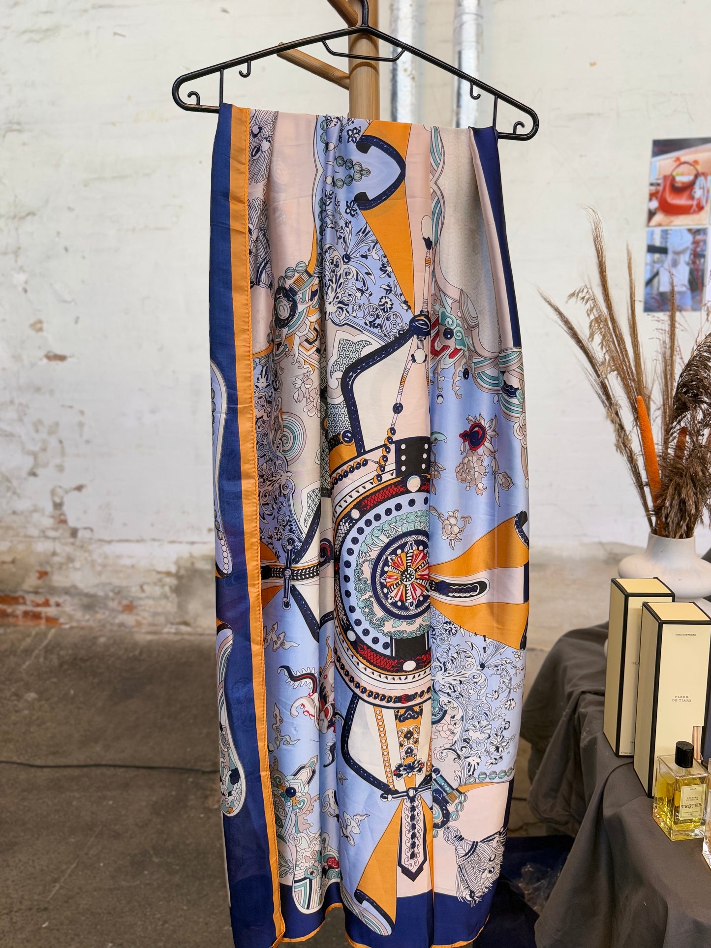 Scarve with light blue ornaments