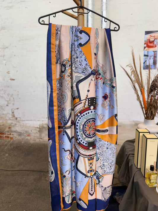 Scarve with light blue ornaments